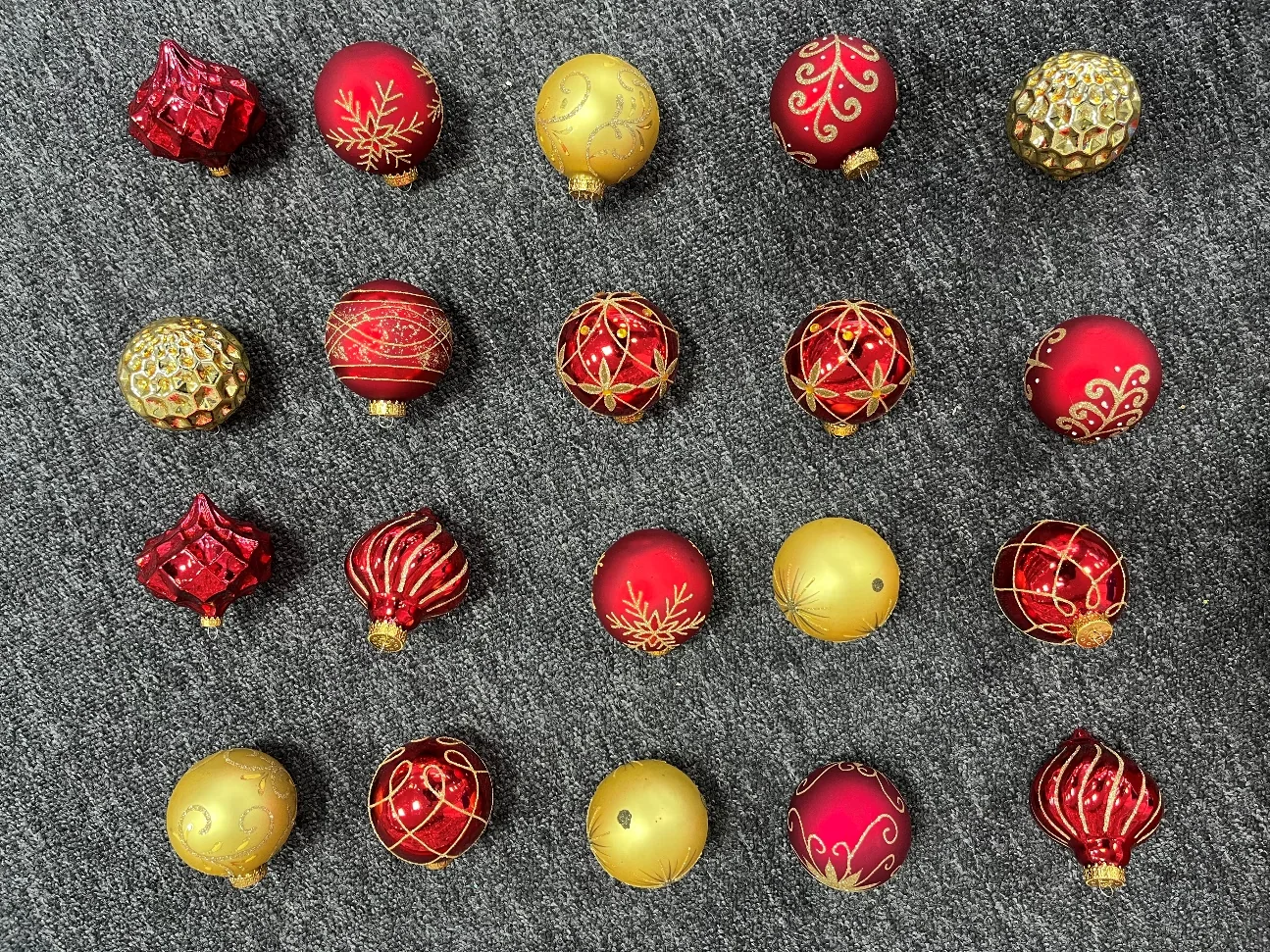 Red and gold Christmas glass balls in assorted finishes