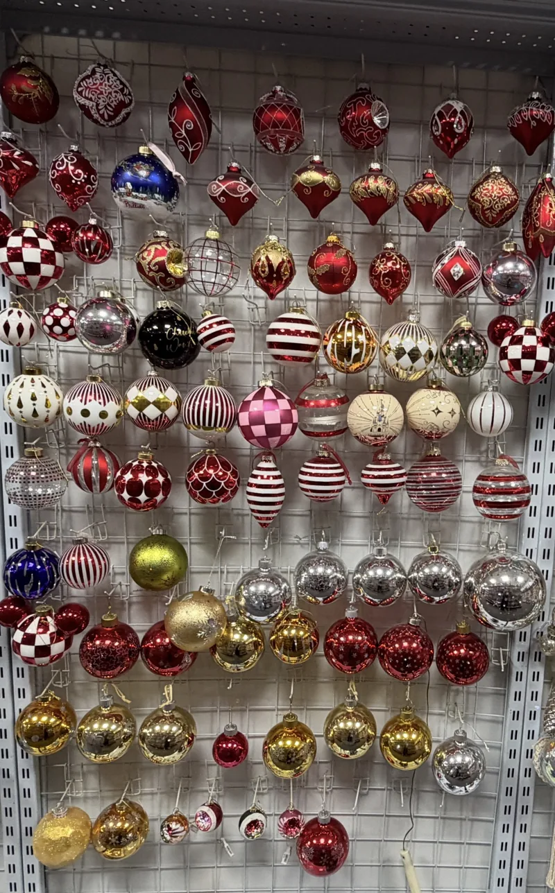 Red, gold and silver glass Christmas ball ornaments on display